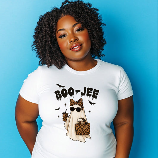 Woman wearing a white t-shirt with a Halloween-themed Ghost with her PSL and Leopard patterned purse design against a blue background