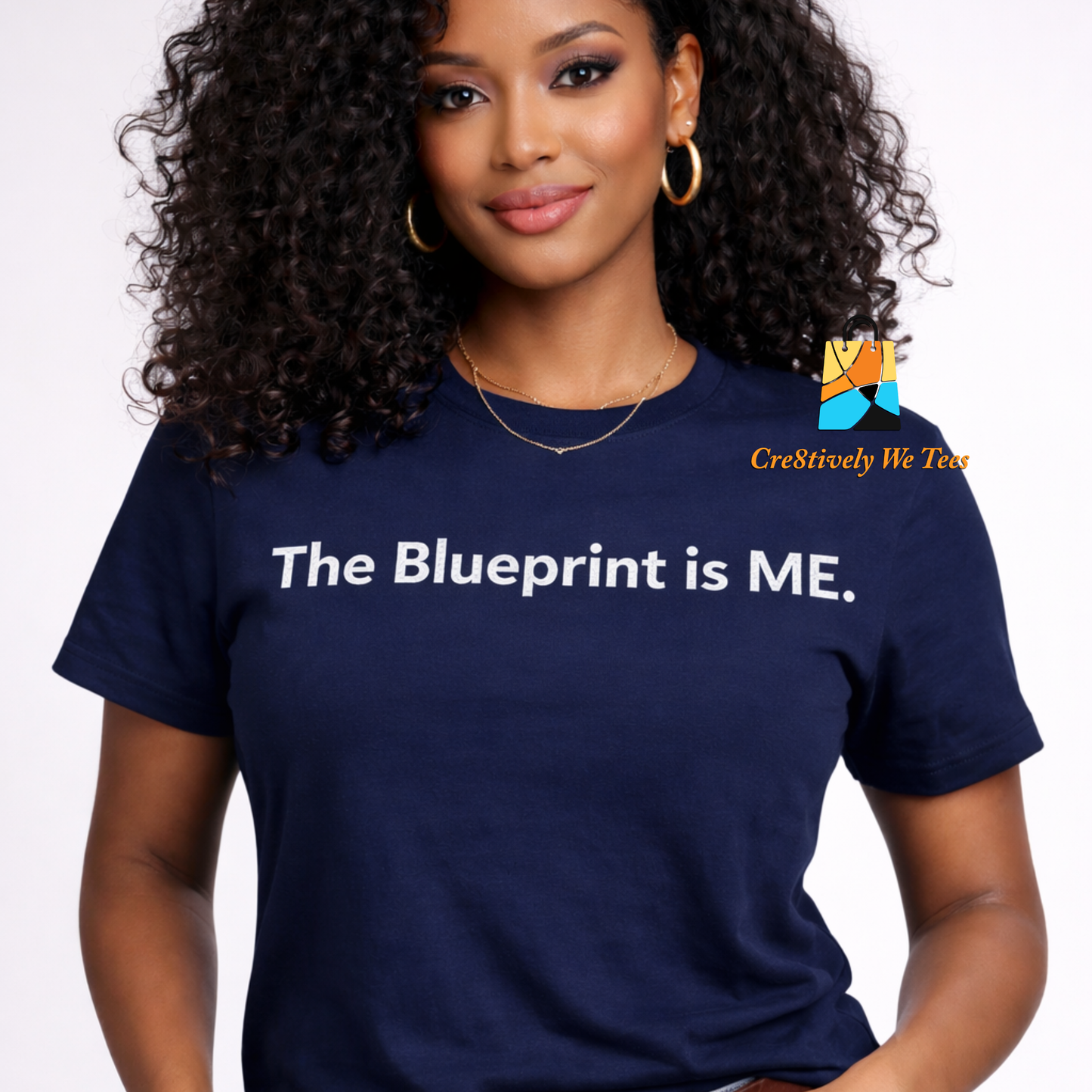 Woman wearing a navy blue t-shirt with 'The Blueprint is ME.' text on a white background