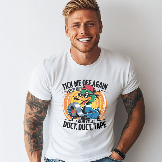 Smiling muscular man wearing a white graphic t-shirt with a funny cartoon duck holding duct tape. Text reads “Tick Me Off Again and We Play a Game Called Duct, Duct, Tape.” Perfect for sarcastic humor lovers and gag gift shoppers.