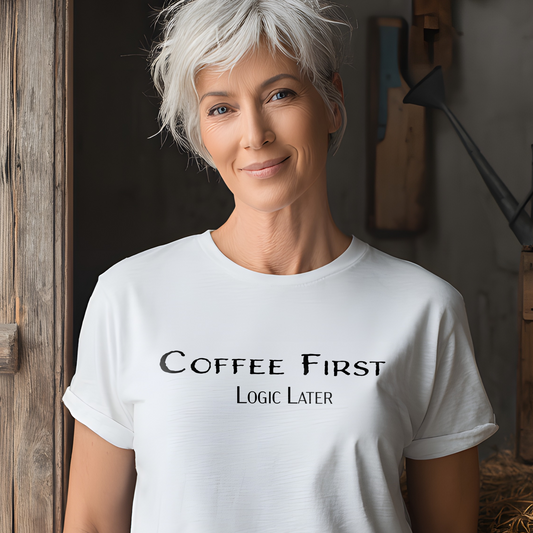 Woman wearing a white t-shirt with 'Coffee First, Logic Later' text in a rustic setting.